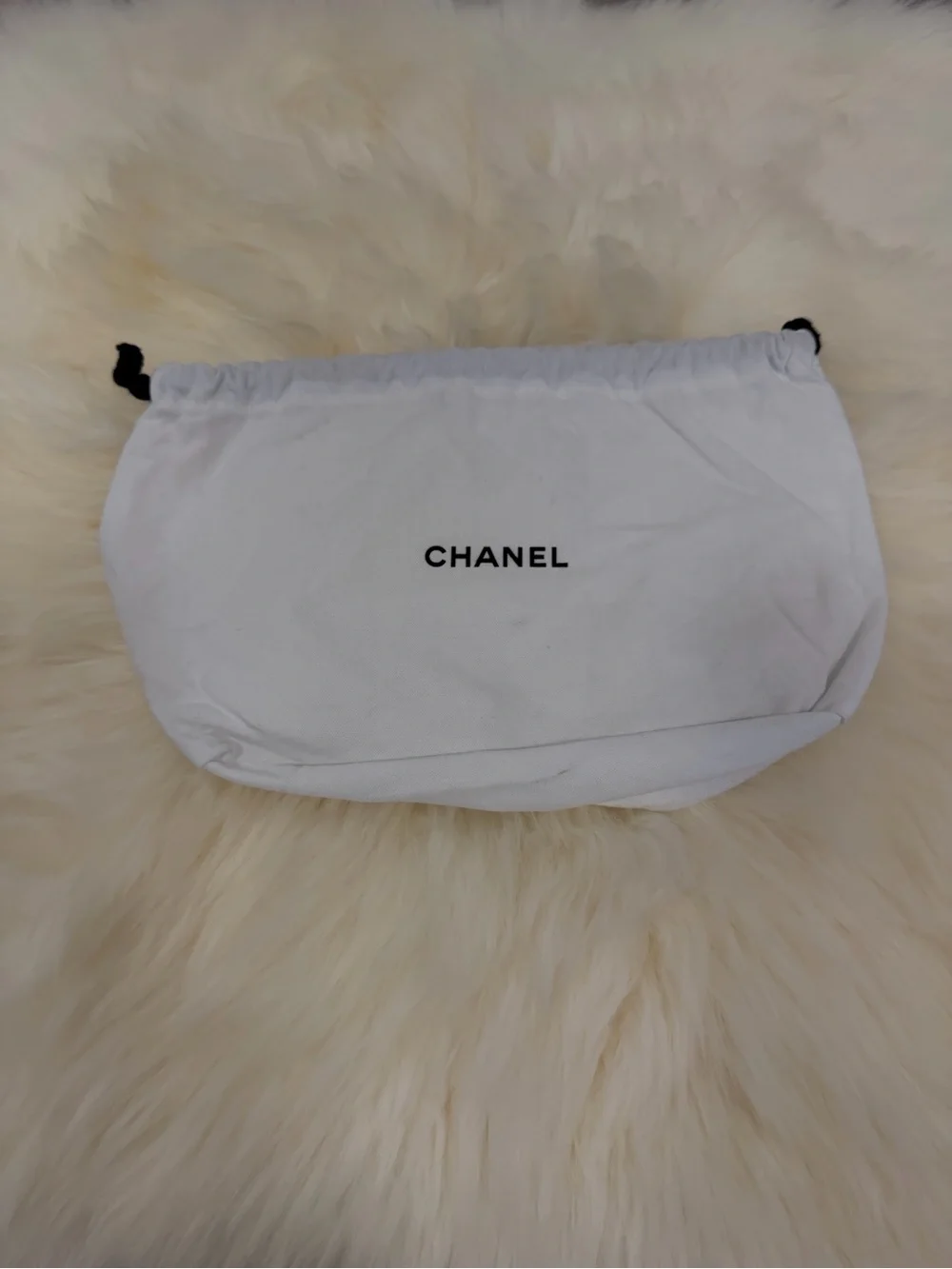 Authentic CHANEL White Dust Pouch with Black Drawstring
